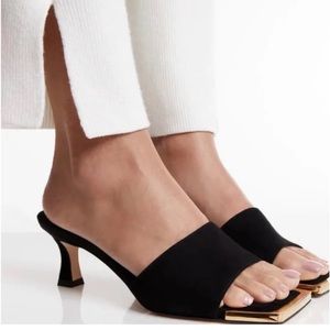 Good American Black and Gold Sandals